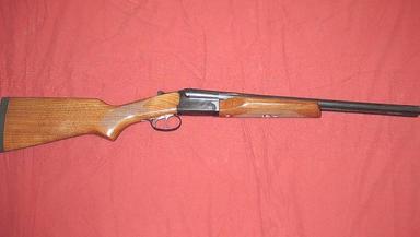 Photo of Stoeger double barrel 20 gauge couch gun - 1