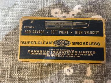 Photo of Vintage box of Canadian imperial ammunition in 300 savage. There are seven original rounds remaining in the box and five brass. - 1