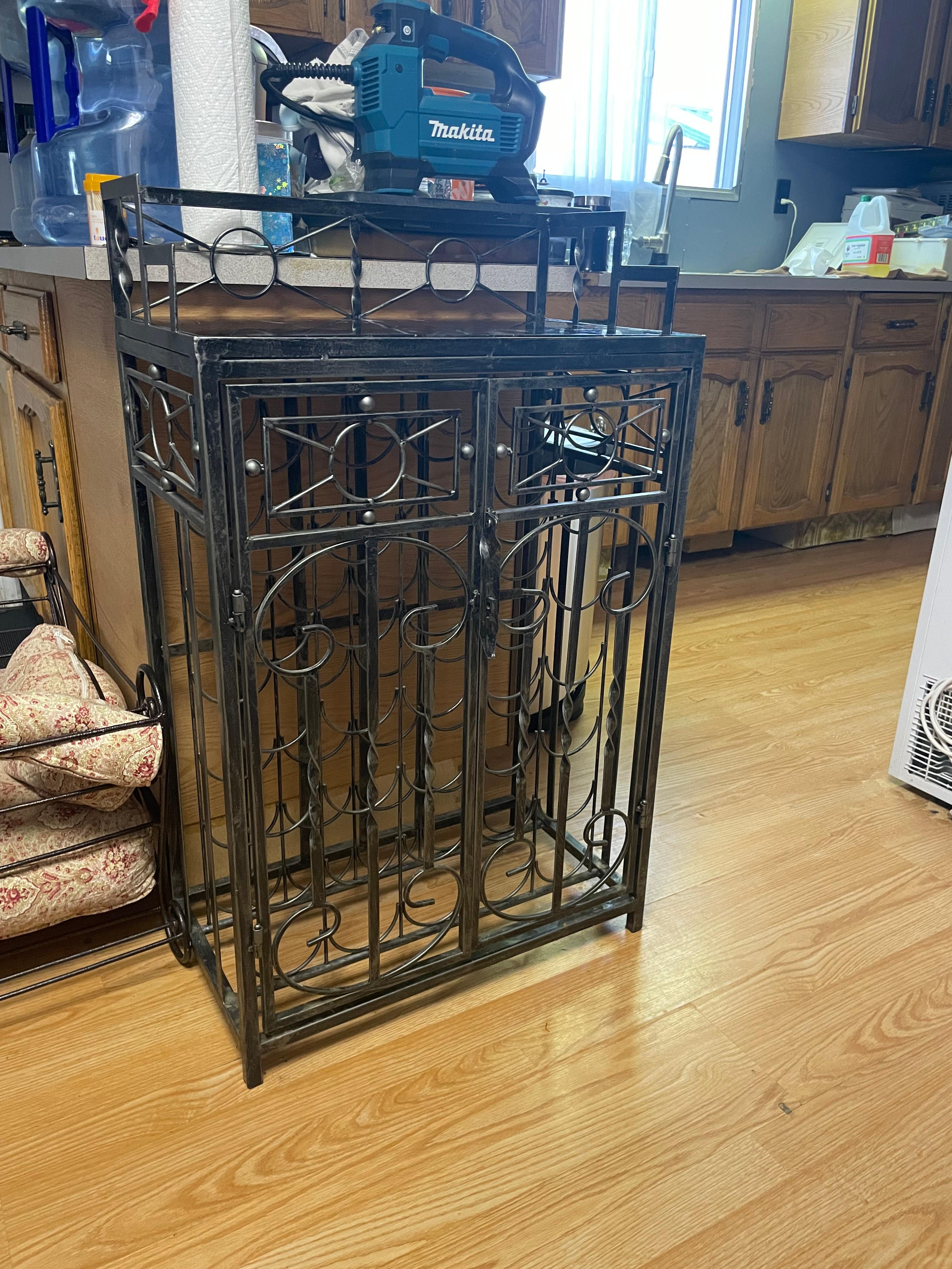 Photo of Rod iron wine rack