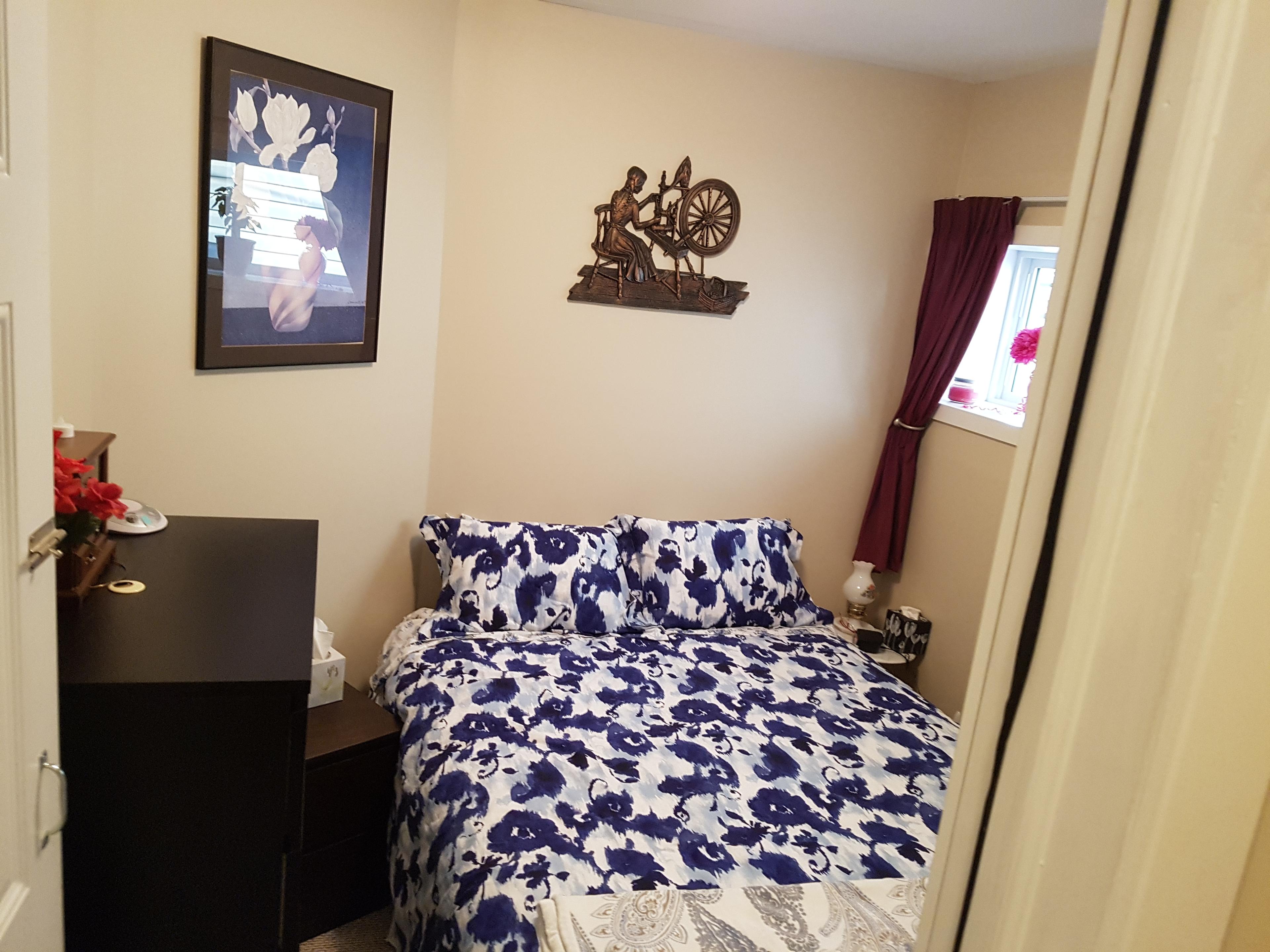 Photo of Cozy Legal one bedroom Basement appartment in Cochrane with separate enterence