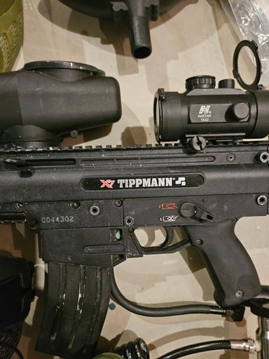 Photo of Tippman paintball gun and accessories.  - 2