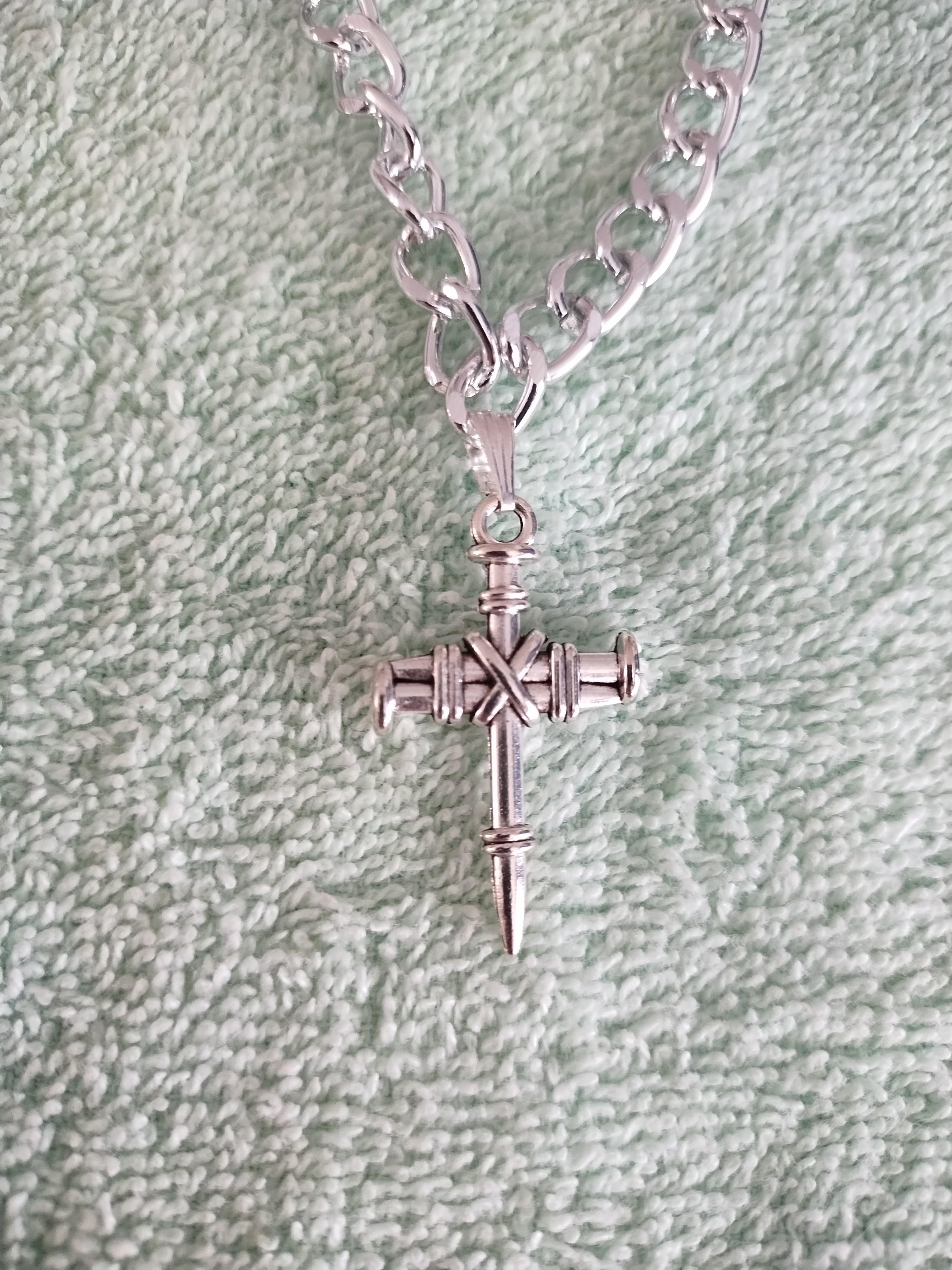 Photo of Cross and skull necklaces I made 