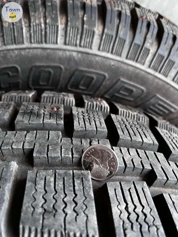 Photo of Cooper Discoverer M+S studded winter tires 265/75R15 with steel rims