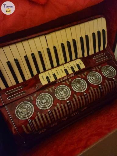 Photo of Old Accordion red - 1