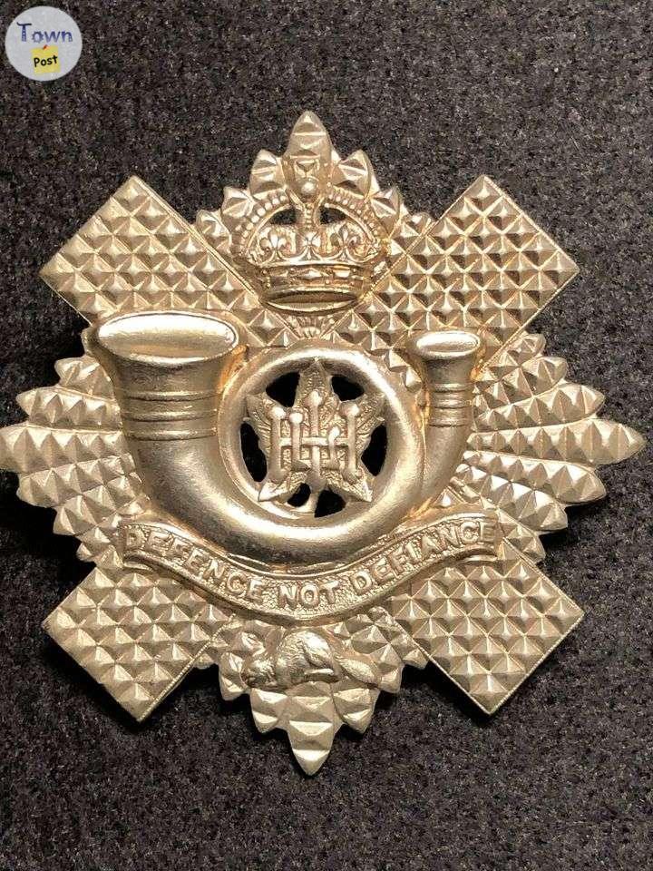 Photo of World War II Canada Highland Light Infantry Cap Badge