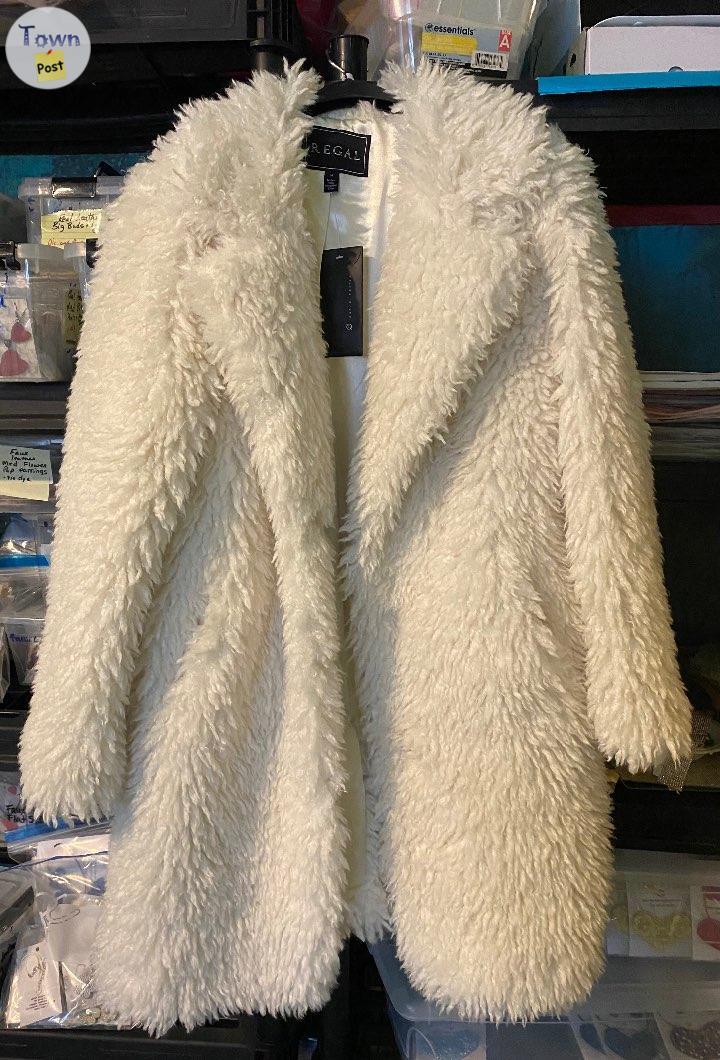 Photo of Brand New Regal faux fur in curly lamb