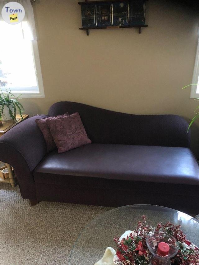 Photo of Burgundy settee with two matching chairs Next to n