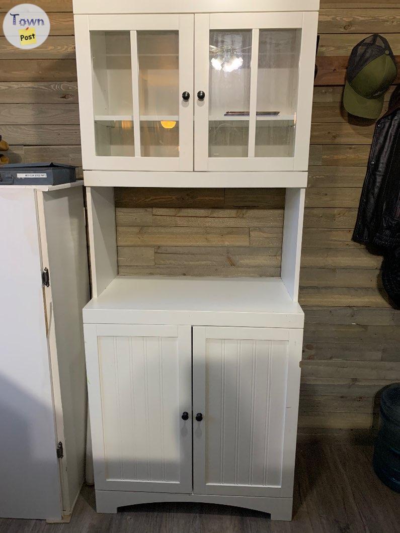 Photo of White cupboard 