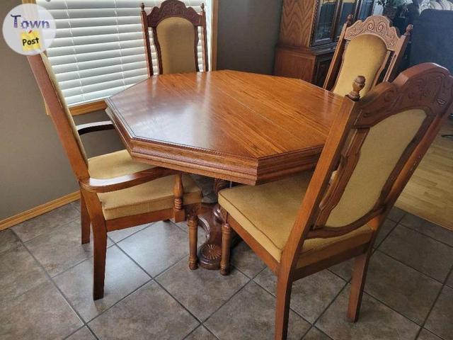 Photo of Dining Table and Chairs