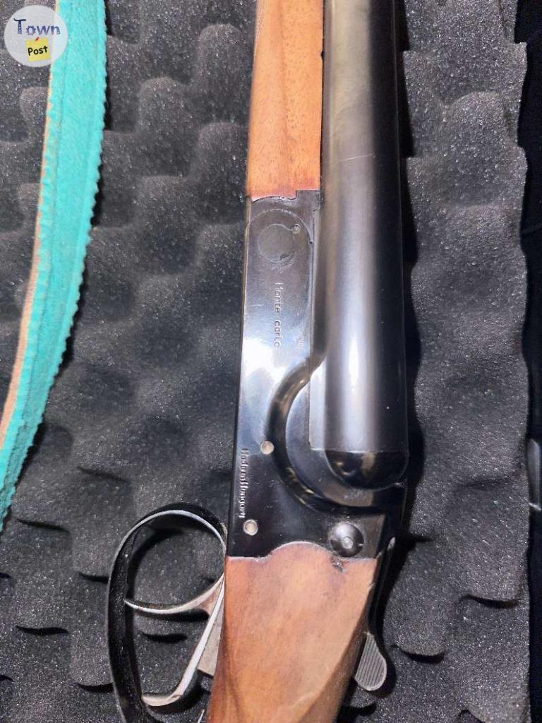 Photo of 12 gauge side by side hunting shotgun