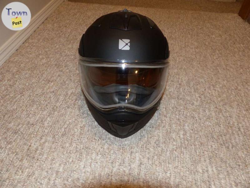 Photo of SNOWMOBILE JACKET AND HELMET