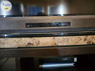 Photo of 70" SHARP LCD TV WITH STAND SOUND BAR AND WOFFER - 1