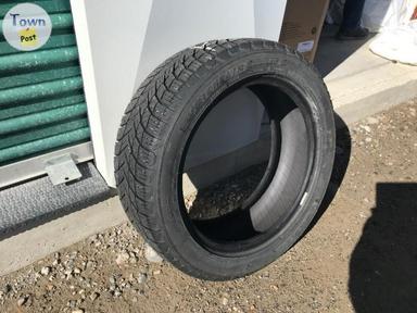 Photo of Winter tire, summer tire and floor mats - 2