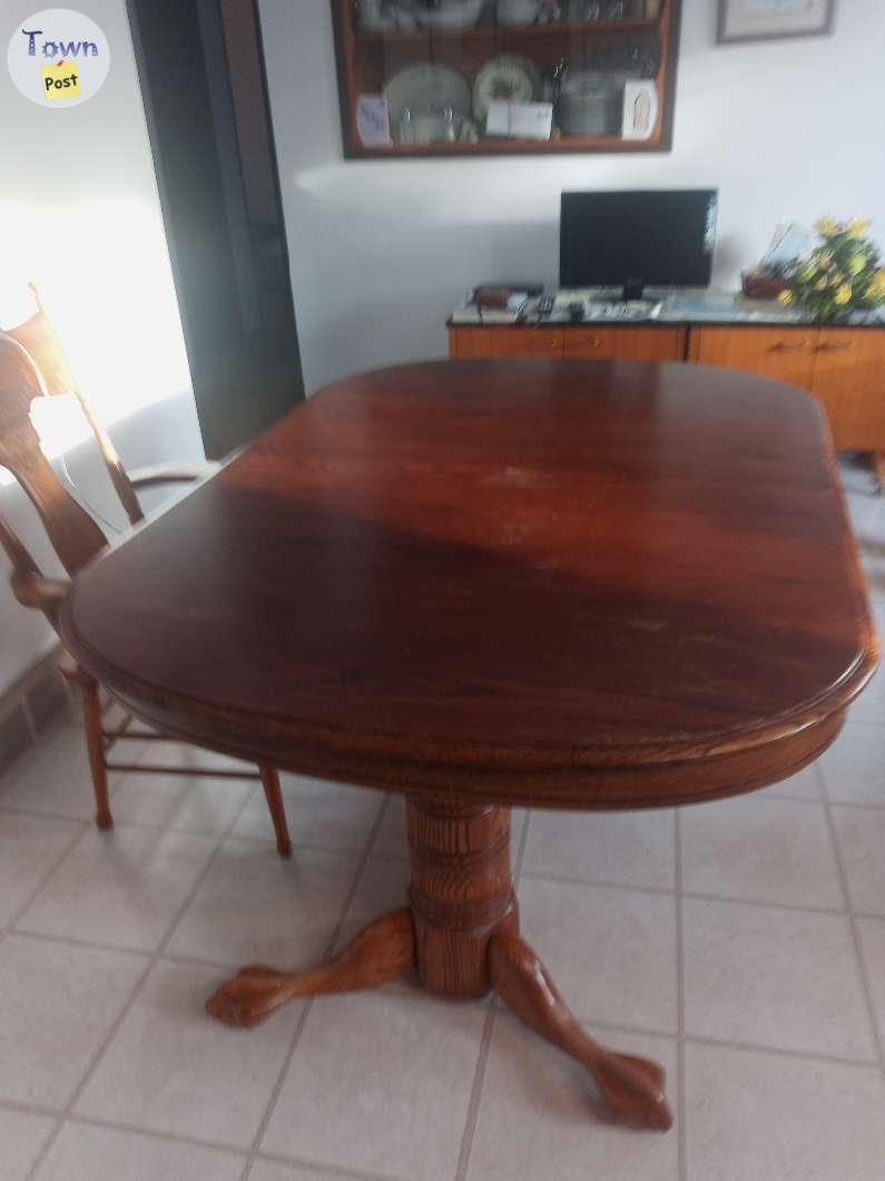 Photo of dinning table with 4 chairs