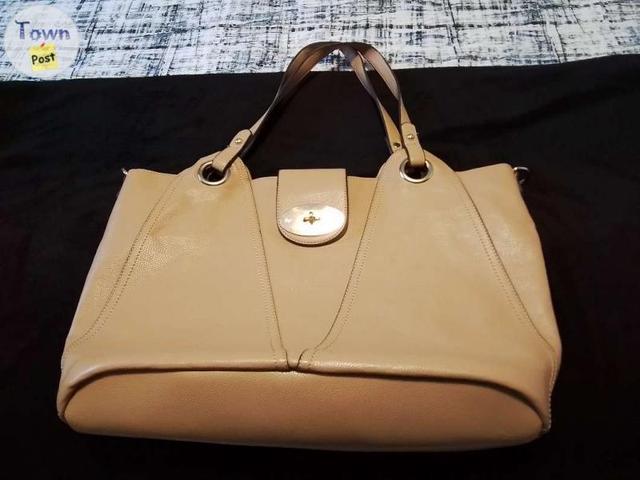 Photo of Large beige leather purse