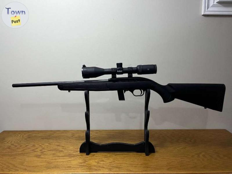 Photo of Mossberg 22 LR brand new with scope