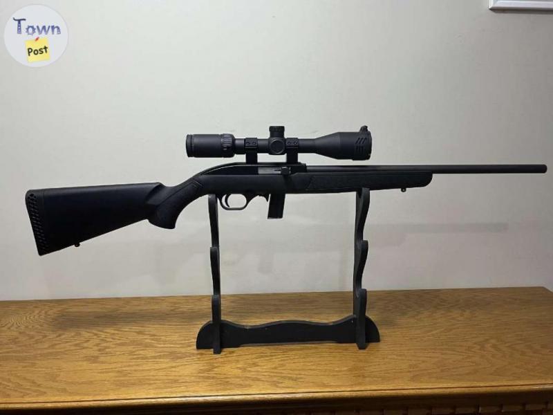 Photo of Mossberg 22 LR brand new with scope