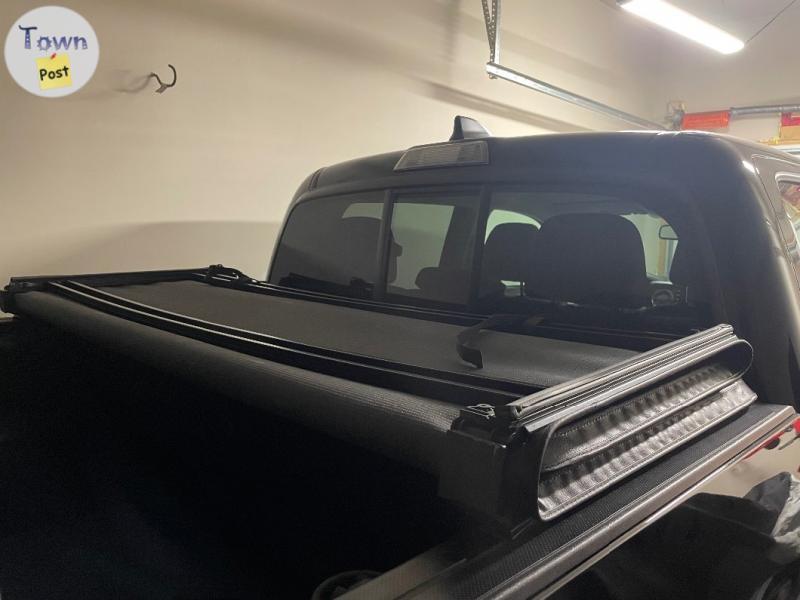 Photo of OEM 6ft Bed Tacoma Tr-Fold Tonneau Cover