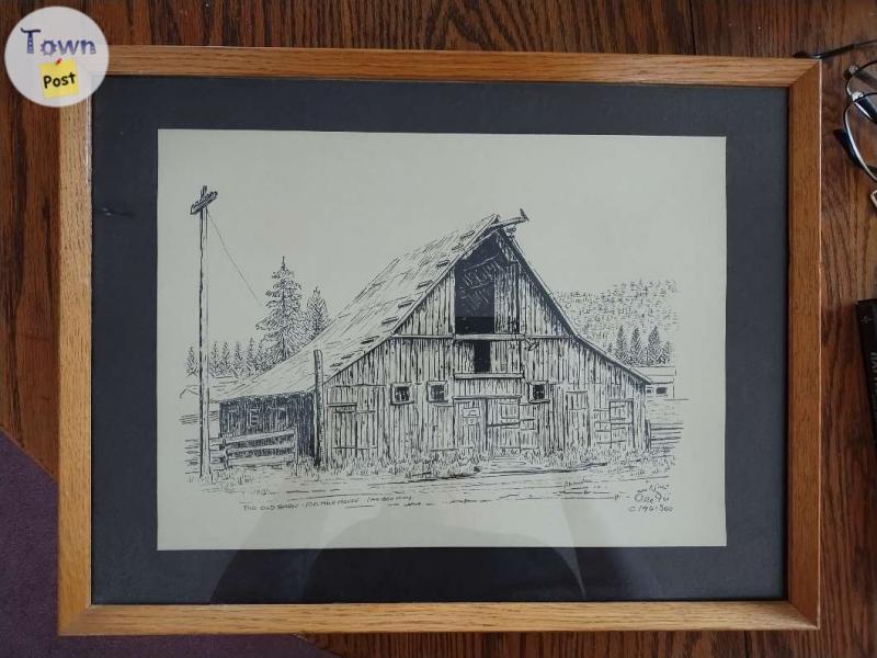 Photo of 2 framed drawings 