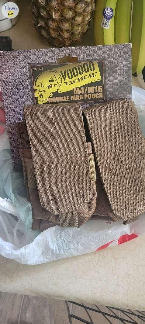 Photo of AR mag pouches and Extra Molley attatchments