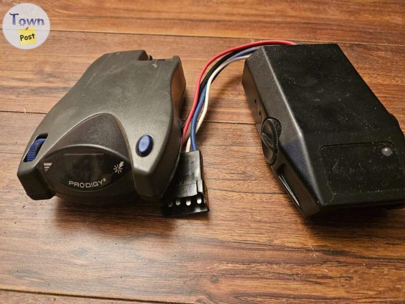 Photo of Prodigy Brake controller and Tekonsha co. brake controller.