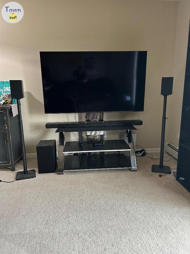 Photo of LG 65” Smart TV, LG Soundbar Surround System, Pedestal TV Stand