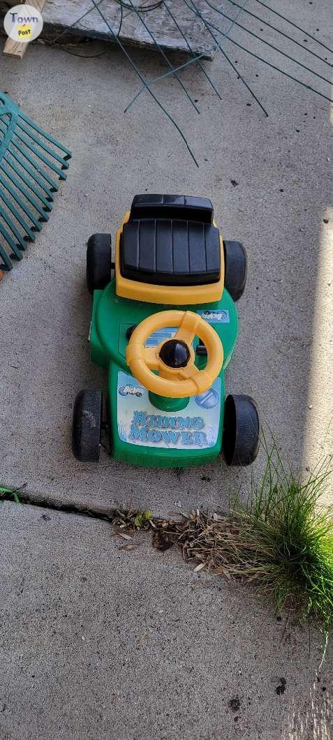 Photo of Toddler ride on lawn mower