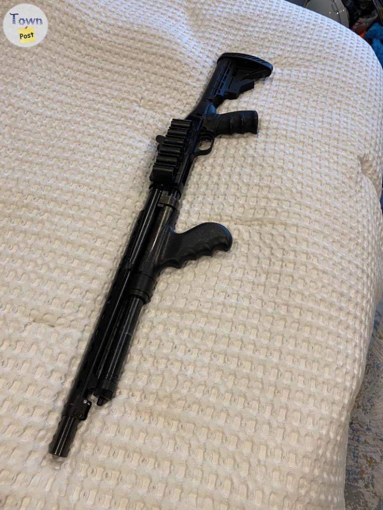 Photo of 12 gage Mossberg 500 tactical shotgun