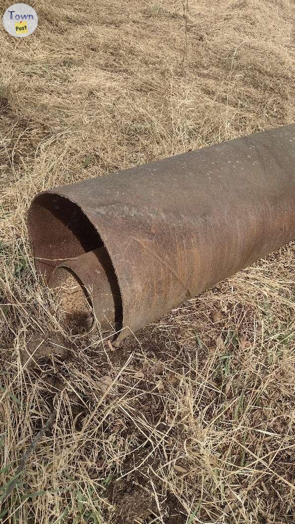 Photo of 15 ft steel pipe 20in diameter. 