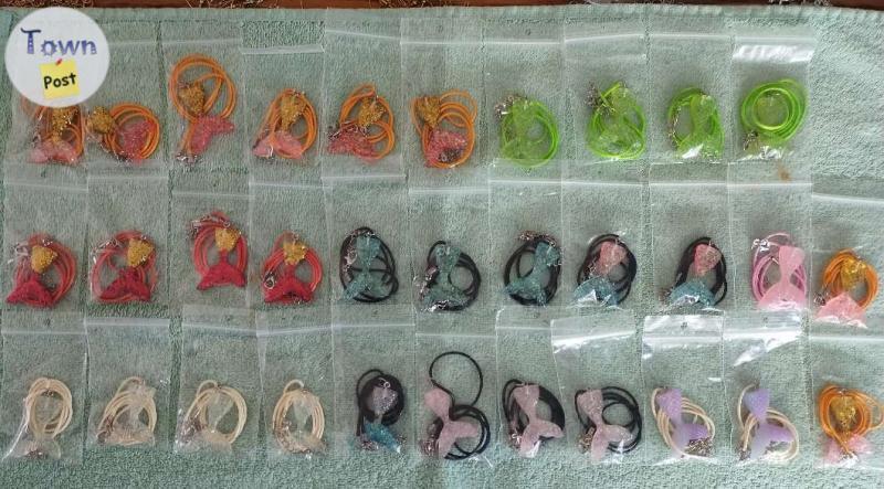 Photo of 32 resin mermaid tail pendant necklaces 