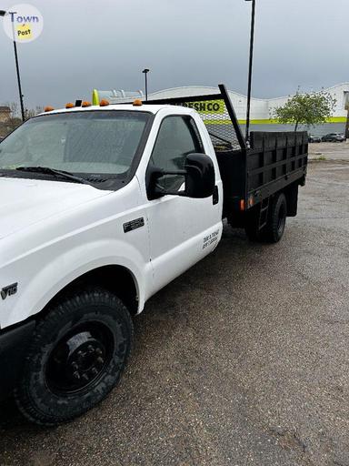 Photo of 1 ton F-350 Dump Truck  - 1