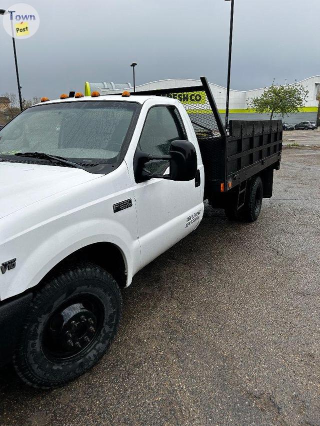 Photo of 1 ton F-350 Dump Truck 