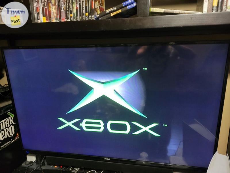 Photo of Original Xbox console and games