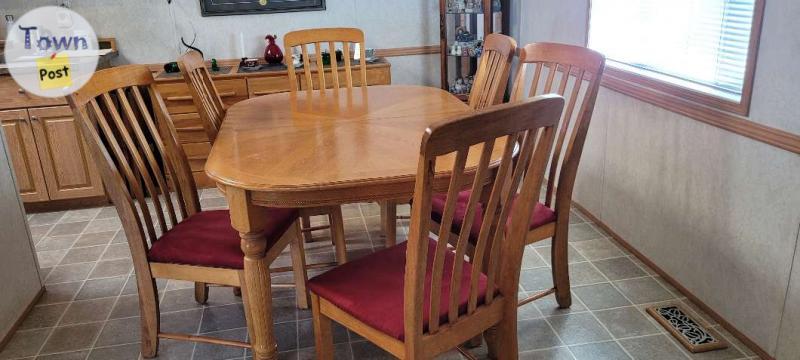 Photo of Oak Dining Table and Six chairs and dresser