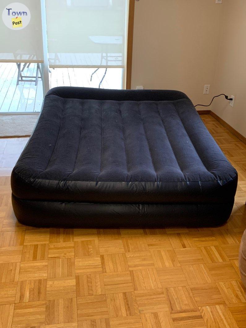 Photo of Woods queen size double high air mattress with built in pump