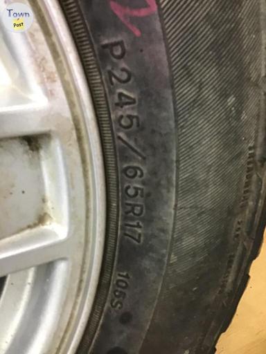 Photo of 245/65/17  4 blizack winter tires 1 Goodyear winter tire from jeep grand Cherokee - 1