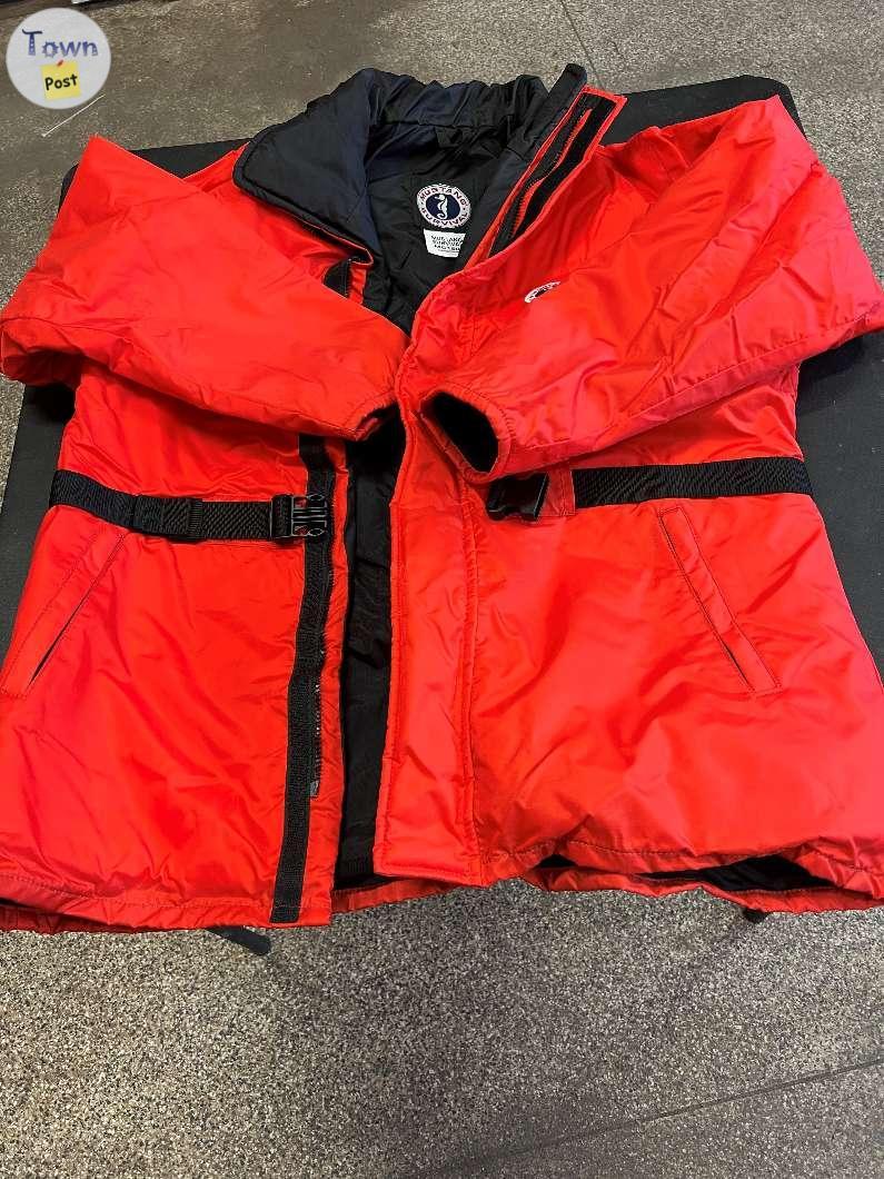 Photo of orange mustang floater coat