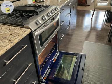 Photo of Kitchen Cabinets, island and appliances - 2