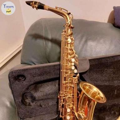 Photo of Gold Saxophone wind instrument - 1