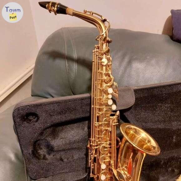 Photo of Gold Saxophone wind instrument