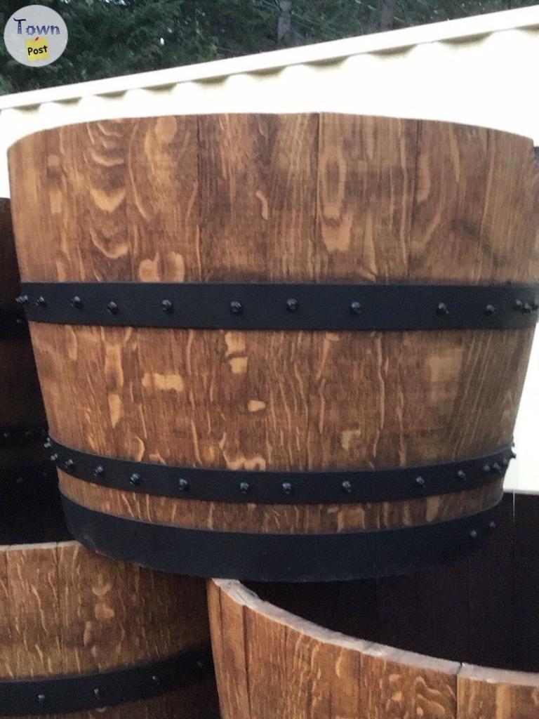 Photo of Half Wine Barrels stained with screw on every stave