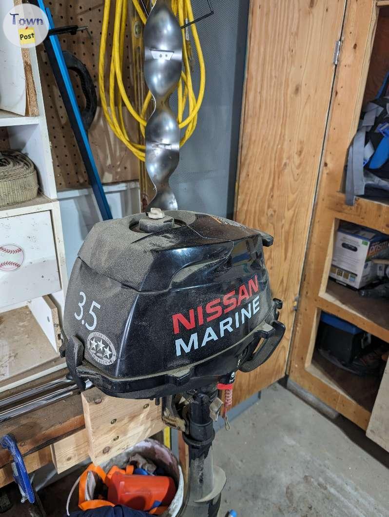 Photo of Nissan 3.5 HP 4 stroke boat motor 