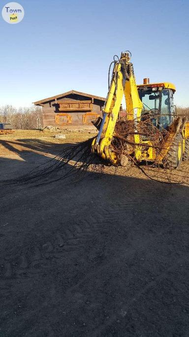 Photo of 2004 John Deere 310 SG loader backhoe - 2