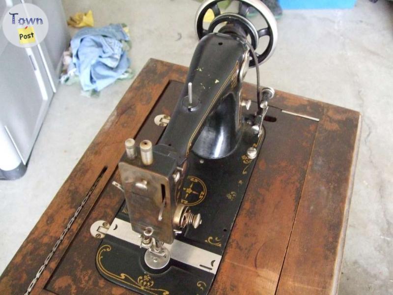 Photo of old seam tree sewing machine