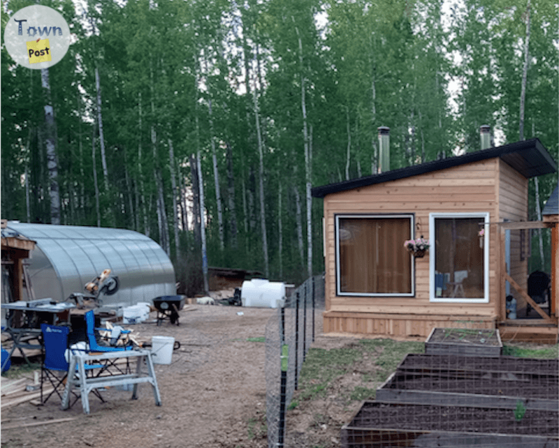 Photo of 12’ x 16’ Cedar Cabin with wood stove