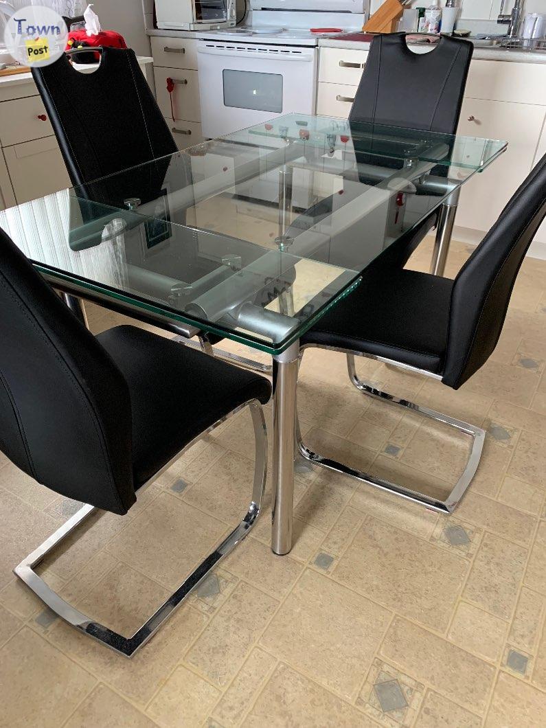 Photo of Glass dining table