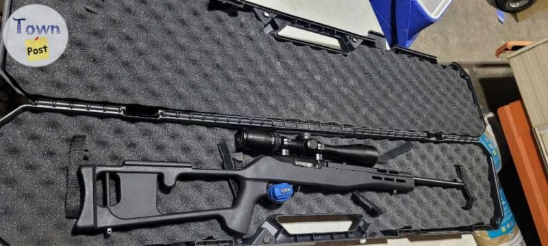 Photo of Ruger 10/22 with a lot of extras