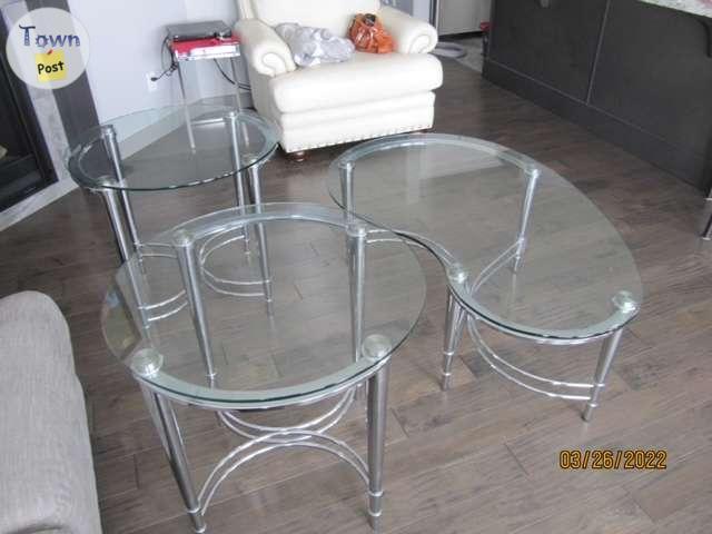 Photo of 3 piece glass coffee tables