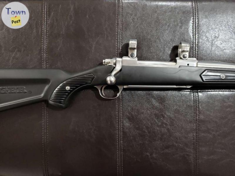 Photo of Ruger M77 Mark II Zytel (Boat Paddle Stock) .270 Win. Stainless/Synthetic Bolt-Action Rifle w/ Rings