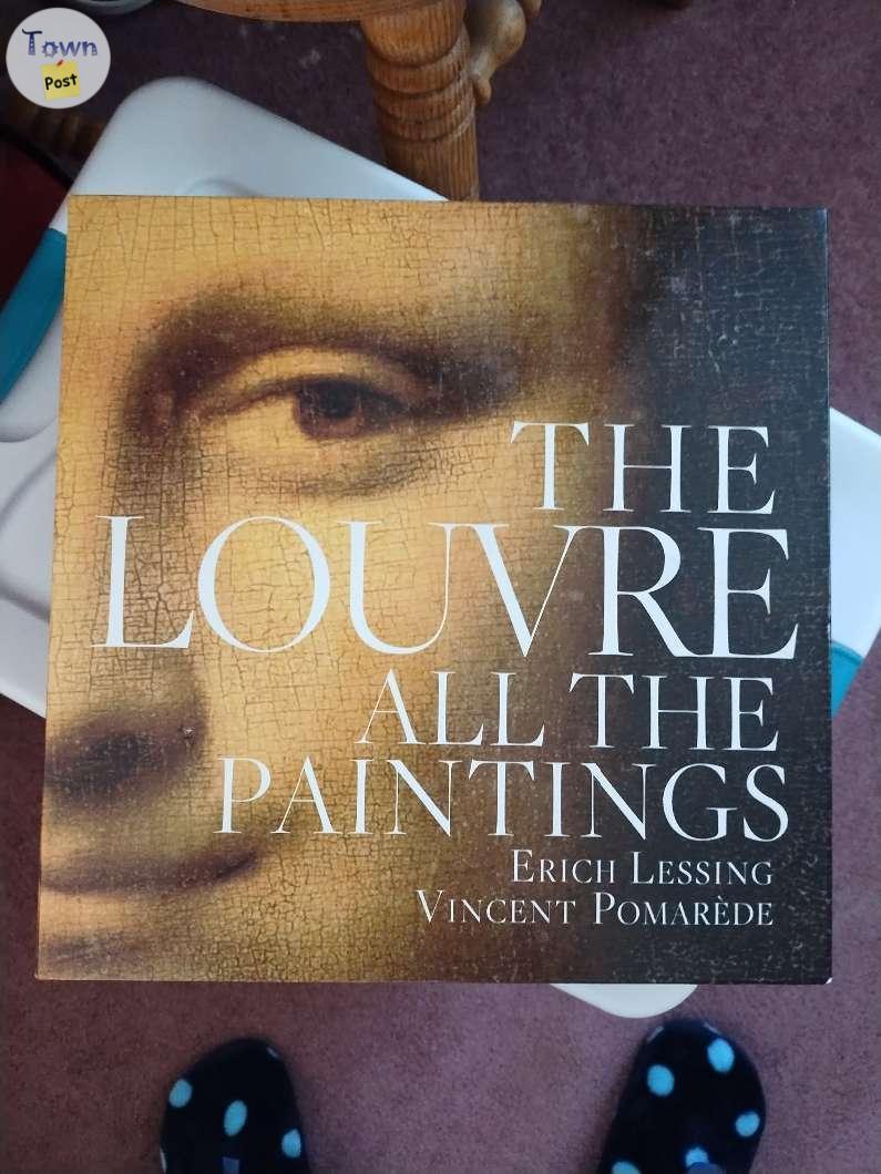 Photo of Big heavy book of the Louvre museum 